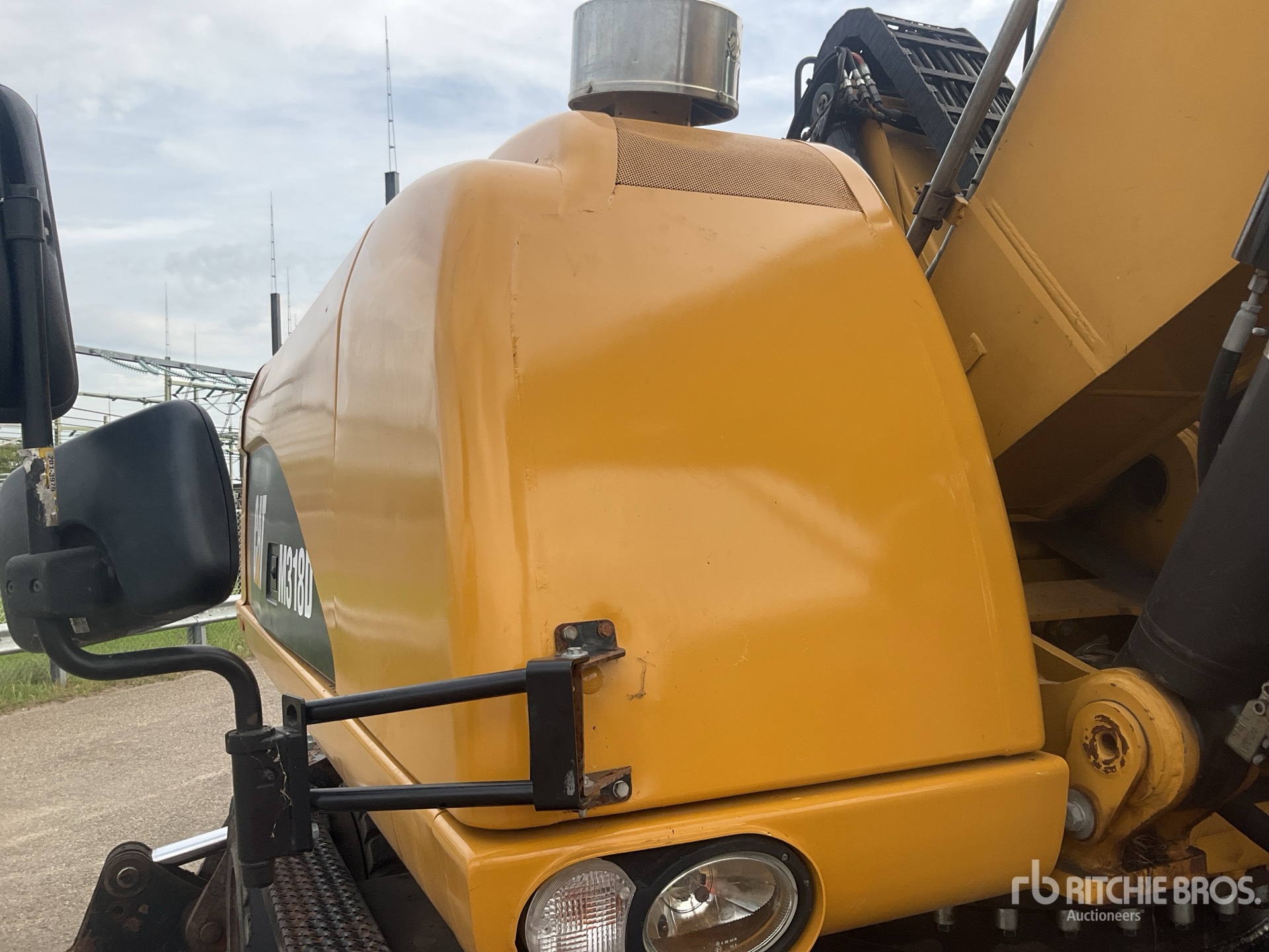 2012 Caterpillar M318D MH