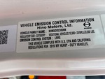 Motore with Emission Label