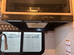 Interior with Stove Hood Exhaust Fan and Vent Cover