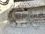 Undercarriage with Left Track Tensioner