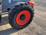 Telehandler* with Left Rear Tire