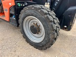 Telehandler* with Left Rear Tire