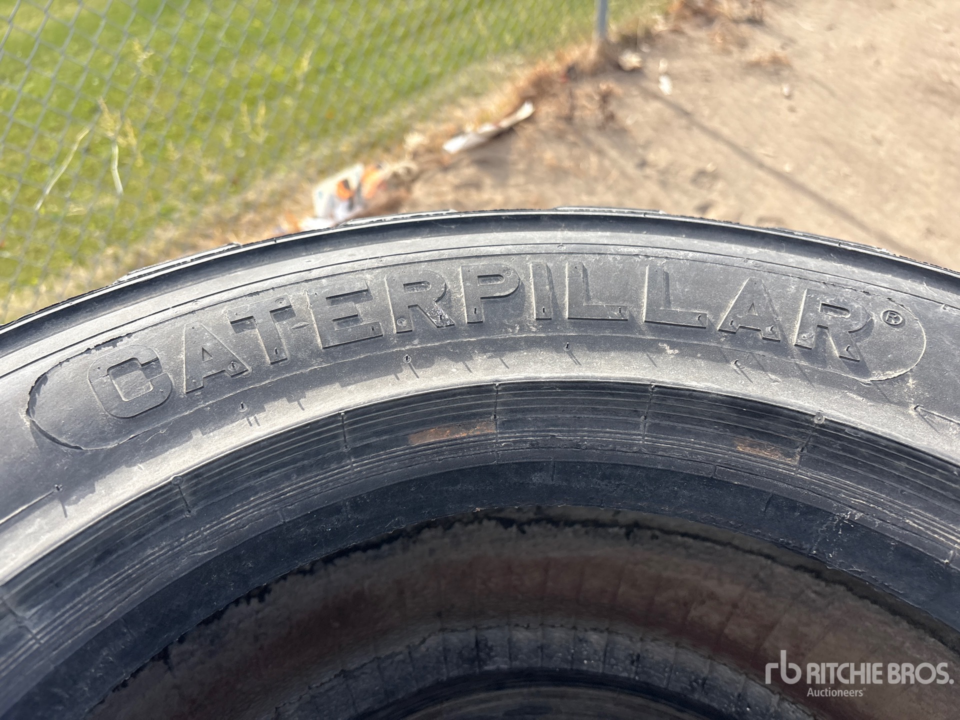 Caterpillar QUANTITY OF (4) 10X16.5 SKID ST ...