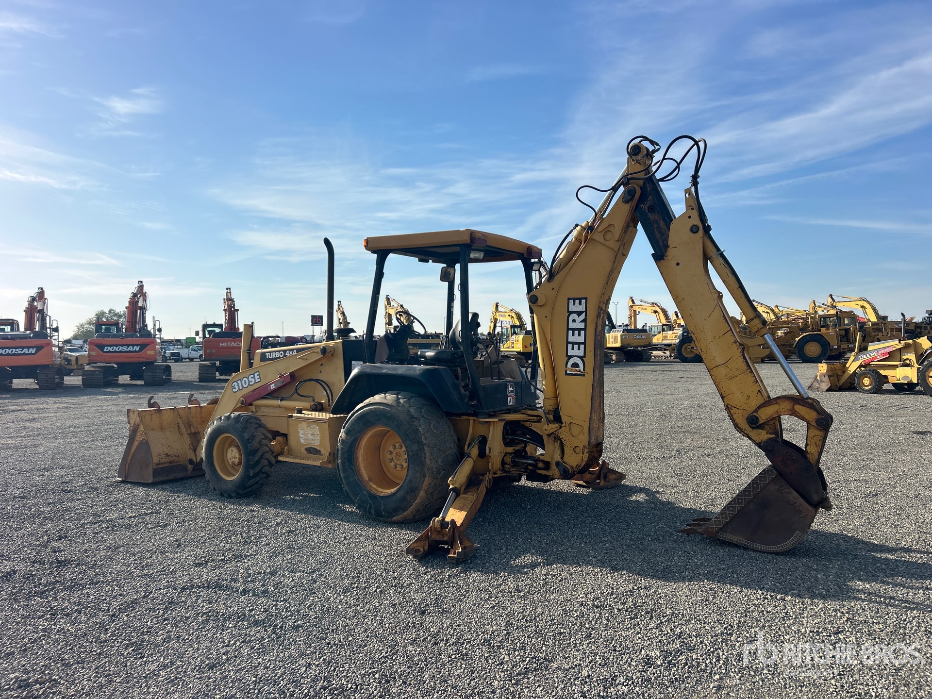 2000 John Deere 310SE
