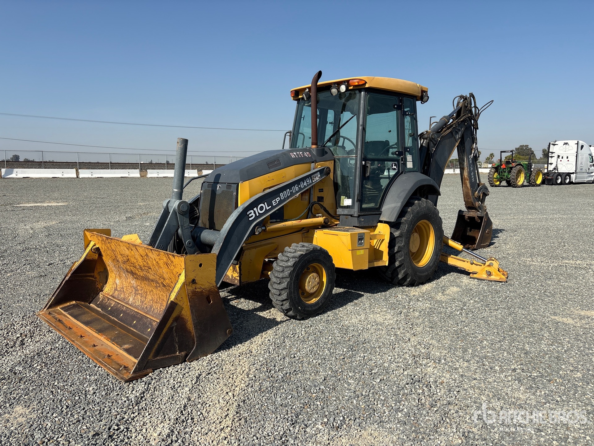 Photo of 2015 John Deere 310L EP